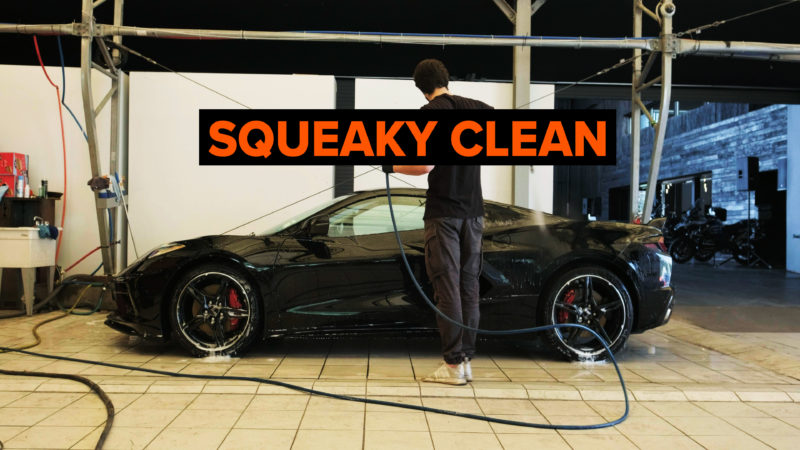 Cleaning a car in the wash bay
