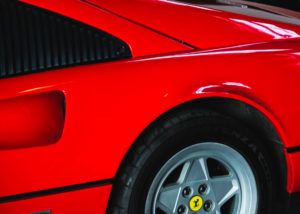 red 1987 Ferrari 328 rear quarter panel